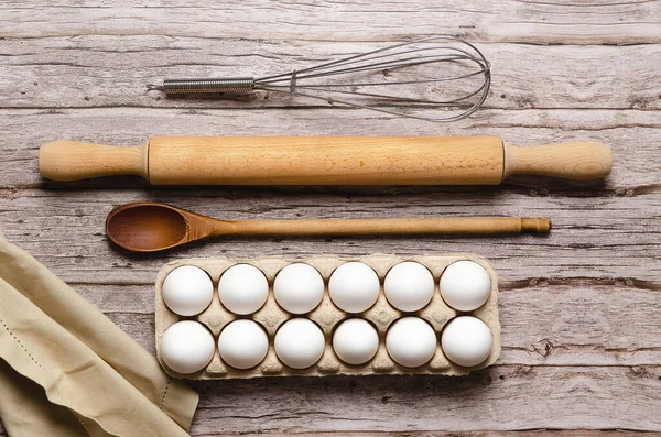 Whisk Rolling Pin Wooden Spoon Some White Eggs Egg Container — Stockfoto