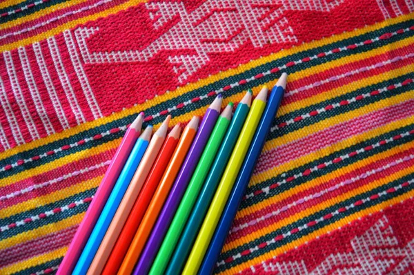colorful felt fabric with multi-colored pencils