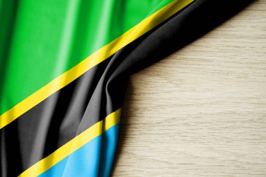 Tanzanya bayrağı. Tanzanya 'nın kumaş desenli bayrağı. 3 boyutlu illüstrasyon. metin için arka boşluk ile. Yakın çekim görünümü.