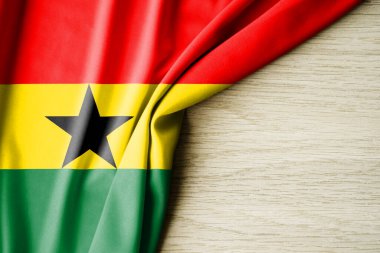 Gana bayrağı. Gana 'nın kumaş desenli bayrağı. 3 boyutlu illüstrasyon. metin için arka boşluk ile. Yakın çekim görünümü.