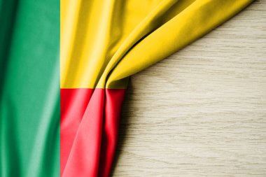 Benin bayrağı. Benin 'in kumaş desenli bayrağı. 3 boyutlu illüstrasyon. metin için arka boşluk ile. Yakın çekim görünümü.