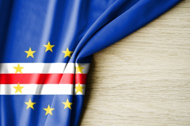 Cape Verde bayrağı. Cape Verde 'nin kumaş desenli bayrağı. 3 boyutlu illüstrasyon. metin için arka boşluk ile. Yakın çekim görünümü.