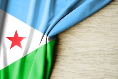 Cibuti bayrağı. Cibuti 'nin kumaş desenli bayrağı. 3 boyutlu illüstrasyon. metin için arka boşluk ile. Yakın çekim görünümü.