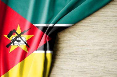 Mozambik bayrağı. Mozambik 'in kumaş desenli bayrağı. 3 boyutlu illüstrasyon. metin için arka boşluk ile. Yakın çekim görünümü.