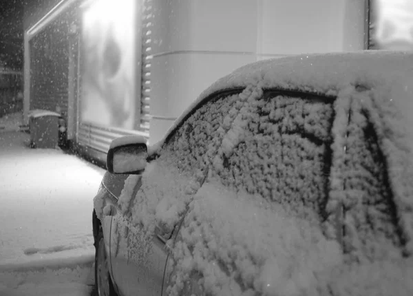 Winter frozen  car window, texture freezing ice glass background.