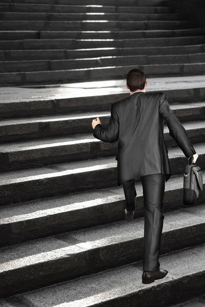 Rear View Male Manager Carrying Suitcase While Walking Upward Stairs — Stock Photo, Image