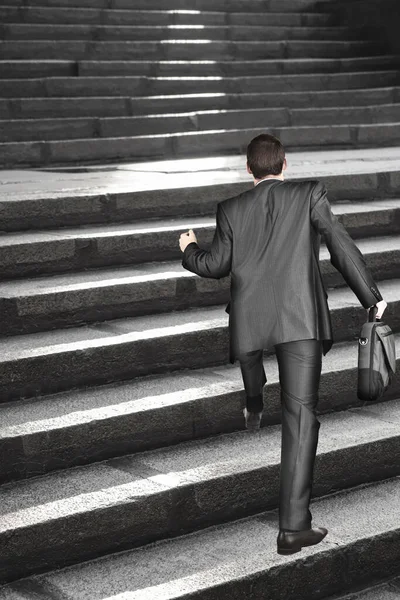 Rear View Male Manager Carrying Suitcase While Walking Upward Stairs — Stock Photo, Image