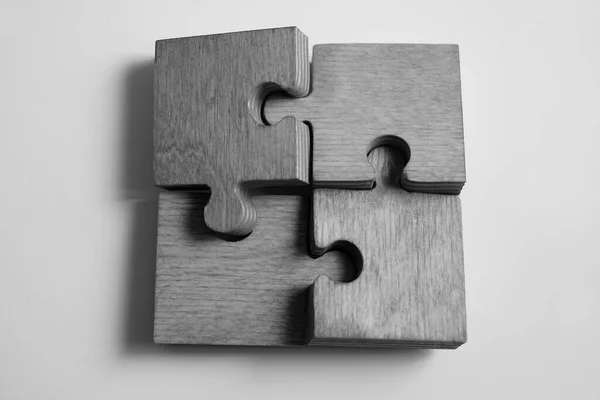 Vier Hölzerne Puzzleteile Konzept Der Verbindung — Stockfoto