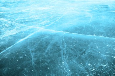 Buz pateni sahası, buz pateni pisti dokusu. Üst Manzara. Buz pateni pistinde paten izleri var. arkaplan