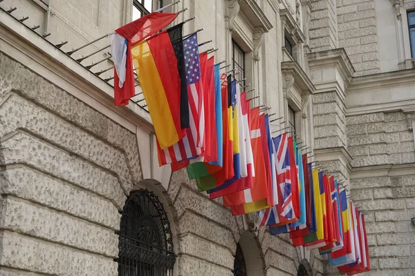 Flags Many Different Countries Flying Stone Building Image Has Copy — Stock Photo, Image