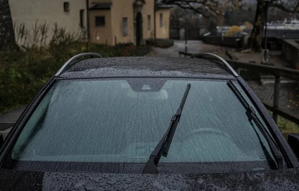 Black Car Hood Fragment Windshield Wipers Raindrops Closeup Photo Front — Stock Photo, Image
