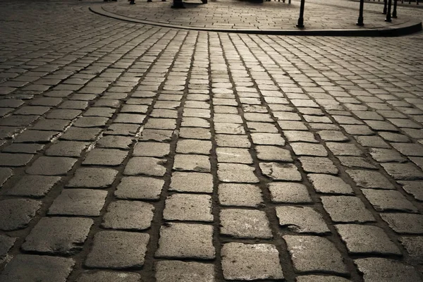 古い舗装スラブ 石舗装 道路のヨーロッパスタイルは 石の質感です ポーランド クラクフ — ストック写真