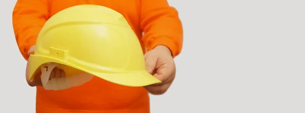 Worker Engineer Holding Yellow Helmet Isolated Background Face Unrecognizable Person — Stock Photo, Image