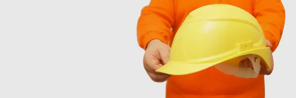 Worker Engineer Holding Yellow Helmet Isolated Background Face Unrecognizable Person — Stock Photo, Image