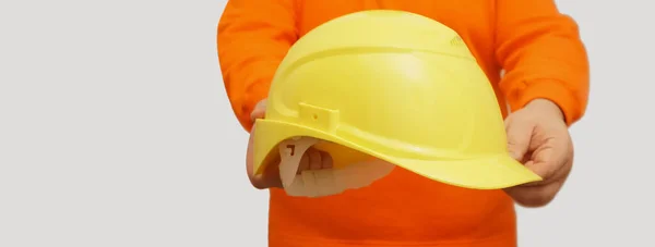 Worker Engineer Holding Yellow Helmet Isolated Background Face Unrecognizable Person — Stock Photo, Image