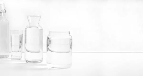 Jar Bottle Water Full Transparent Glasses White Table Kitchen Interior — Stockfoto