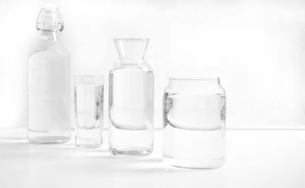 Jar Bottle Water Full Transparent Glasses White Table Kitchen Interior — Stockfoto