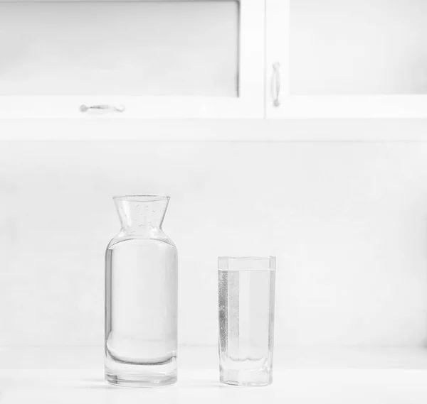 Jar Bottle Water Full Transparent Glasses White Table — Stock Photo, Image