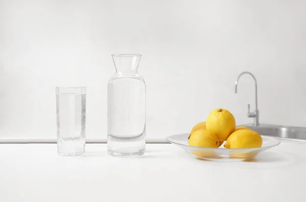 Fresh Lemons Glass Bottle Pure Water Standing Wooden Table Modern — Foto Stock