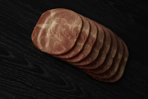 Top View One Row Smoked Salami Sausage Slices Isolated Black — Stock Photo, Image