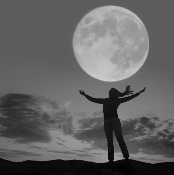Silhouette Woman Raised Hands Facing Wave Full Moon — Stock Photo, Image