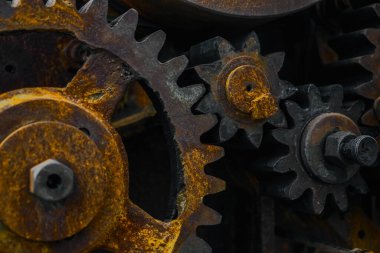 Eski endüstriyel paslı aletlerin yakın çekimi. Mekanik arka plan. Eski mekanik dişli çark. Yaklaş. yaşlandırılmış dişliler