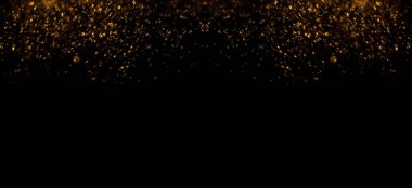Güneş ışınları arka planında altın parıltı ve parıltı. Parlak ışık çiziminde sarı toz. Siyah duvar kâğıdı dizaynında parlayan parlak toz. Noel veya tatil kartı dekorasyonu.