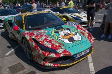 Rga, Latvia - June 25, 2022: European sport car show event Onelife Rally in Riga, Latvia. Lamborghini, Ferrari, Porsche, McLaren, Bentley waiting for their adventure. Luxury automobiles for Supercar lovers 