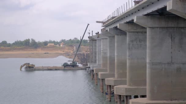 View Riverside Steel Pipe Being Drilled Riverbed Bridge Foundation Bridge — Stock Video