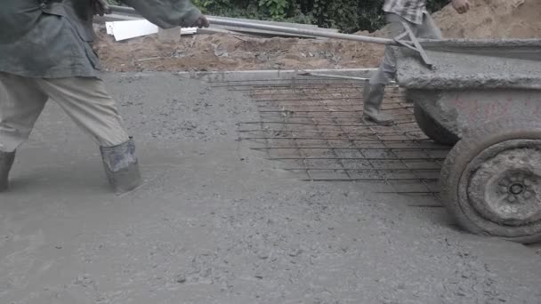 Close Construction Workers Unloading Cement Road Construction — Stock Video