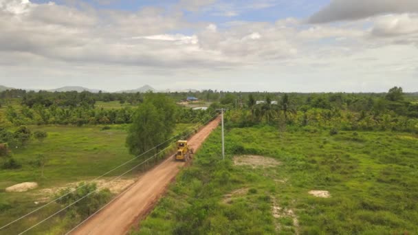 Aerial Drone Shot Road Grader Widening Side Rural Road Countryside — Stock video
