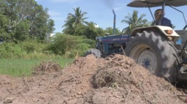 Kampot  - Cambodia - 07 -09- 2021 :  Field soil reclamation in preparation for the construction and expansion of housing ( close up )