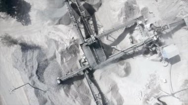 rising up drone shot of conveyor belts transporting gravel at the construction site 