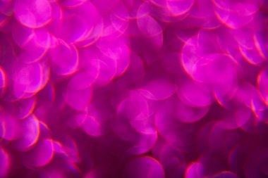 Doku oval mor nesnelerden yaratıldı. Etki, simli yüzeyi odaklanmadan makro ölçekte fotoğraflayarak elde edildi..