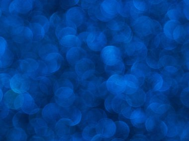 Doku oval mavi nesnelerden yaratıldı. Etki, simli yüzeyi odaklanmadan makro ölçekte fotoğraflayarak elde edildi..