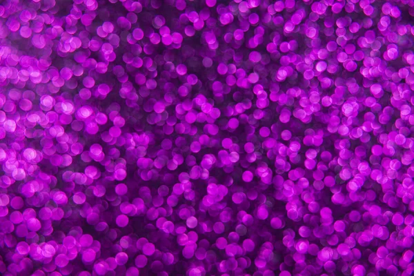 Doku oval mor nesnelerden yaratıldı. Etki, simli yüzeyi odaklanmadan makro ölçekte fotoğraflayarak elde edildi..