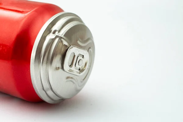 Swollen soda can ready to explode, isolated on white background