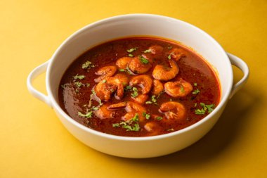 Kolambi Kalwan ya da Tikhle olarak da bilinen Goan Karidesleri ya da Karides Körisi ya da Zinga Masala