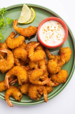 shrimp fritters or prawn bajji or jheenga pakoda or kolambi or zinga pakora, Indian snack food clipart