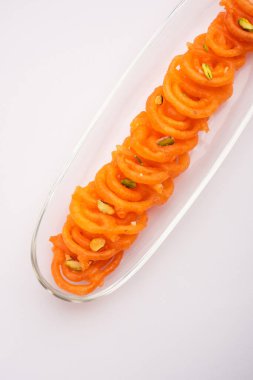 Jalebi ya da Jilbi 'nin ya da Imarati' nin stok fotoğrafı. Saf ghee 'de kızartılmış Hint yemeği.