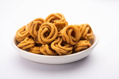 Murukku aynı zamanda Chakli Güney Hindistan geleneksel vejetaryen atıştırmalığı olarak da bilinir.