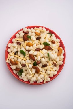 Sago or sabudana Chivda is Sweet and Spicy deep fried Farsan for upwas or vrat diet Or Fasting Food, Served in a bowl clipart