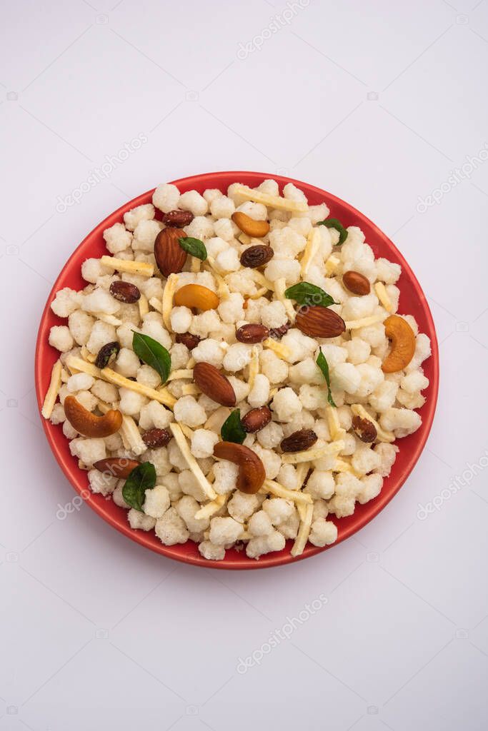 Sago or sabudana Chivda is Sweet and Spicy deep fried Farsan for upwas or vrat diet Or Fasting Food, Served in a bowl