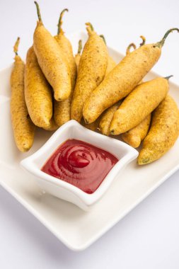 Son derece lezzetli ve ağız sulandırıcı Pakora ya da Mirchi Pakoda, Pakistanlı ve Hint Halkı.