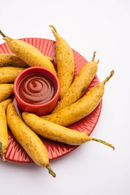 Son derece lezzetli ve ağız sulandırıcı Pakora ya da Mirchi Pakoda, Pakistanlı ve Hint Halkı.