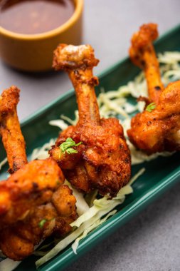 Tavuk lolipop Hint Çin aperatifi. Fransız tavuk kanadı.