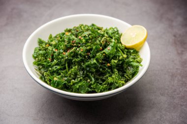 Çatırdayan ıspanak ya da çıtır çıtır Palak, limon dilimli bir kâse veya tabakta servis edilen Hint marşıdır.