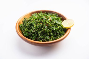 Çatırdayan ıspanak ya da çıtır çıtır Palak, limon dilimli bir kâse veya tabakta servis edilen Hint marşıdır.