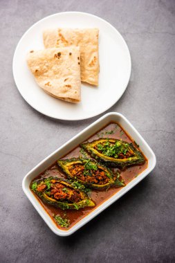 Bharwa Karela masala or stuffed bitter melon curry recipe
