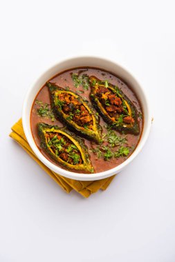 Bharwa Karela masala or stuffed bitter melon curry recipe